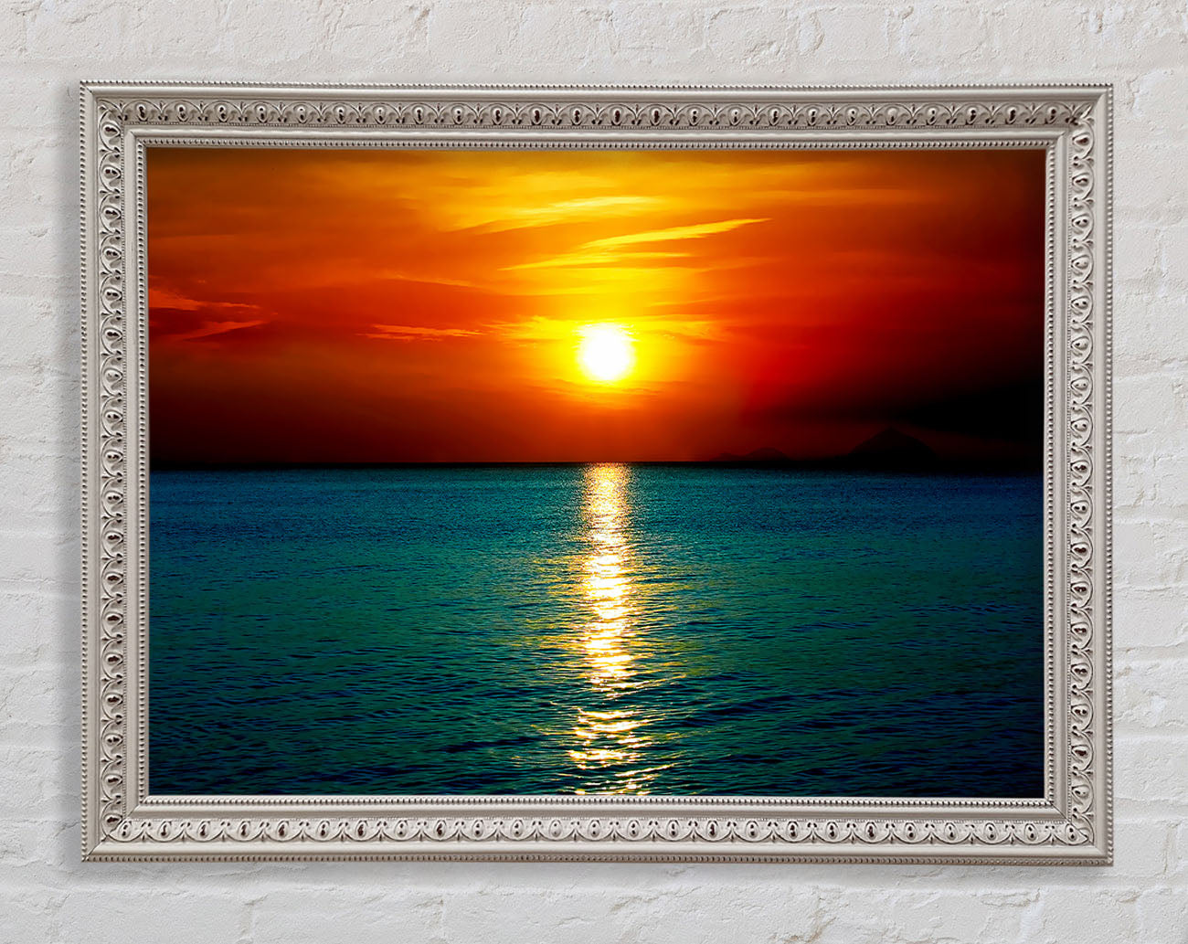 As The Sun Goes Down Over The Turquoise Ocean Framed Wall Art
