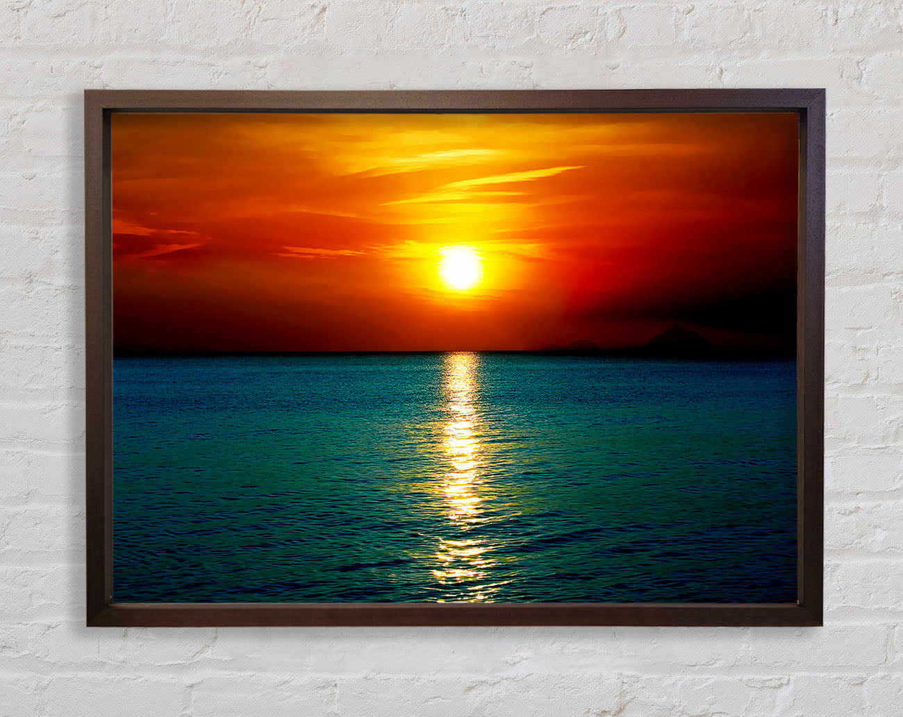 As The Sun Goes Down Over The Turquoise Ocean Framed Wall Art