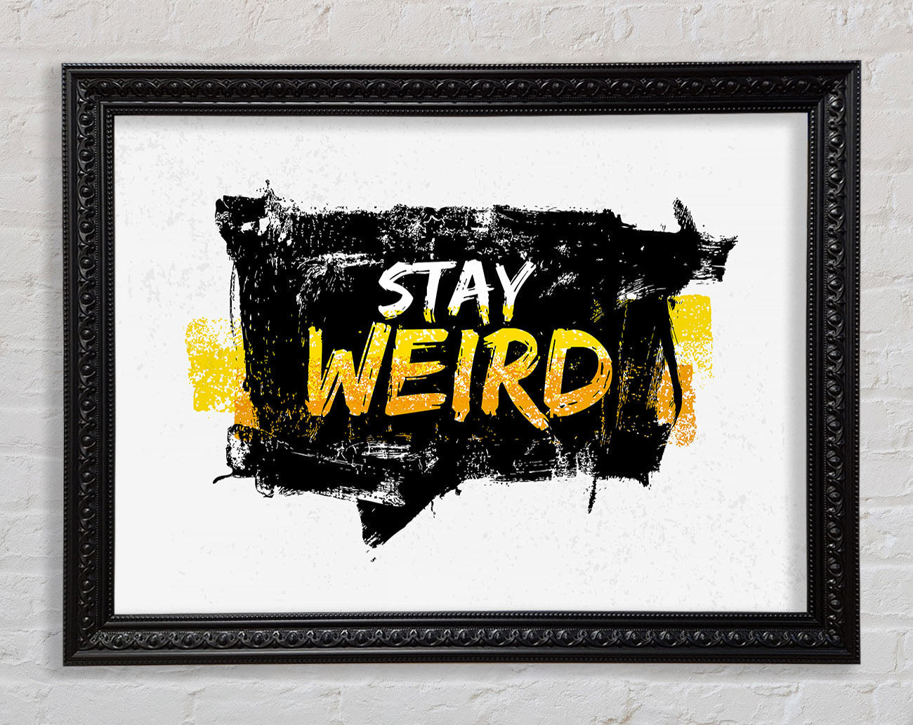 Stay Weird Framed Print