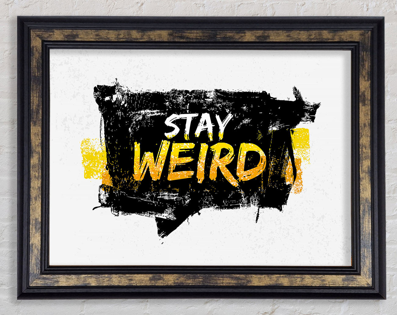 Stay Weird Framed Print