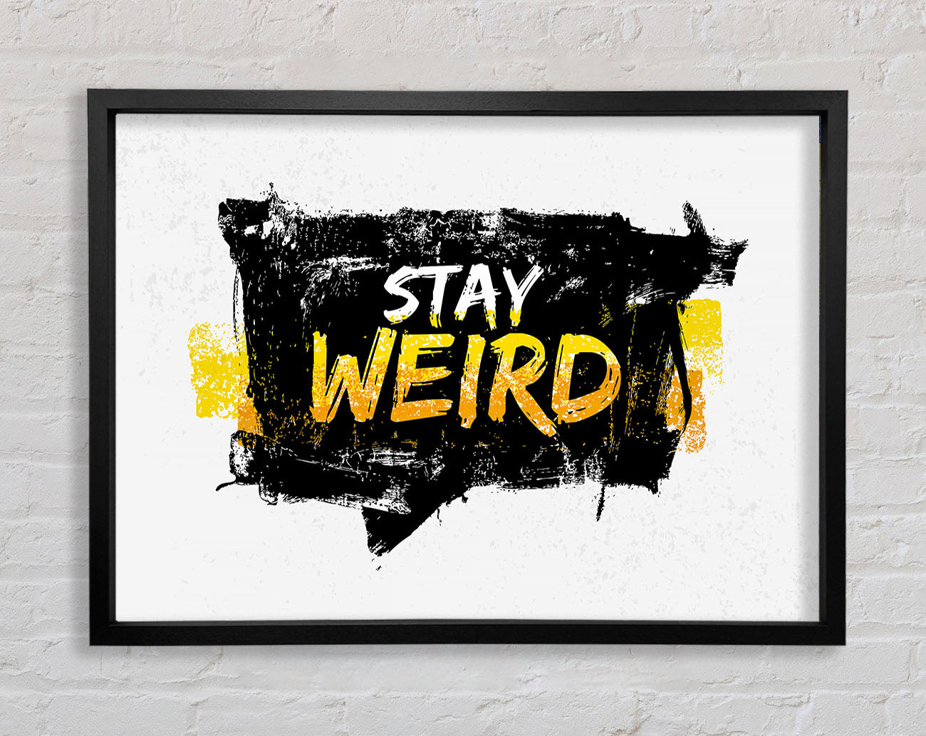 Stay Weird Framed Print