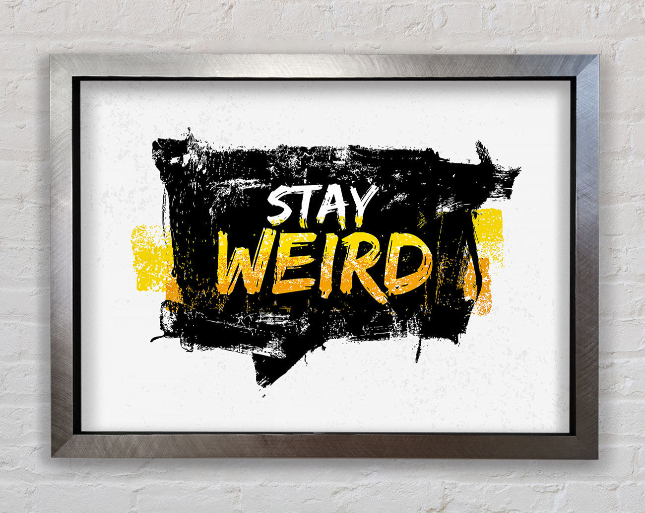 Stay Weird Framed Print