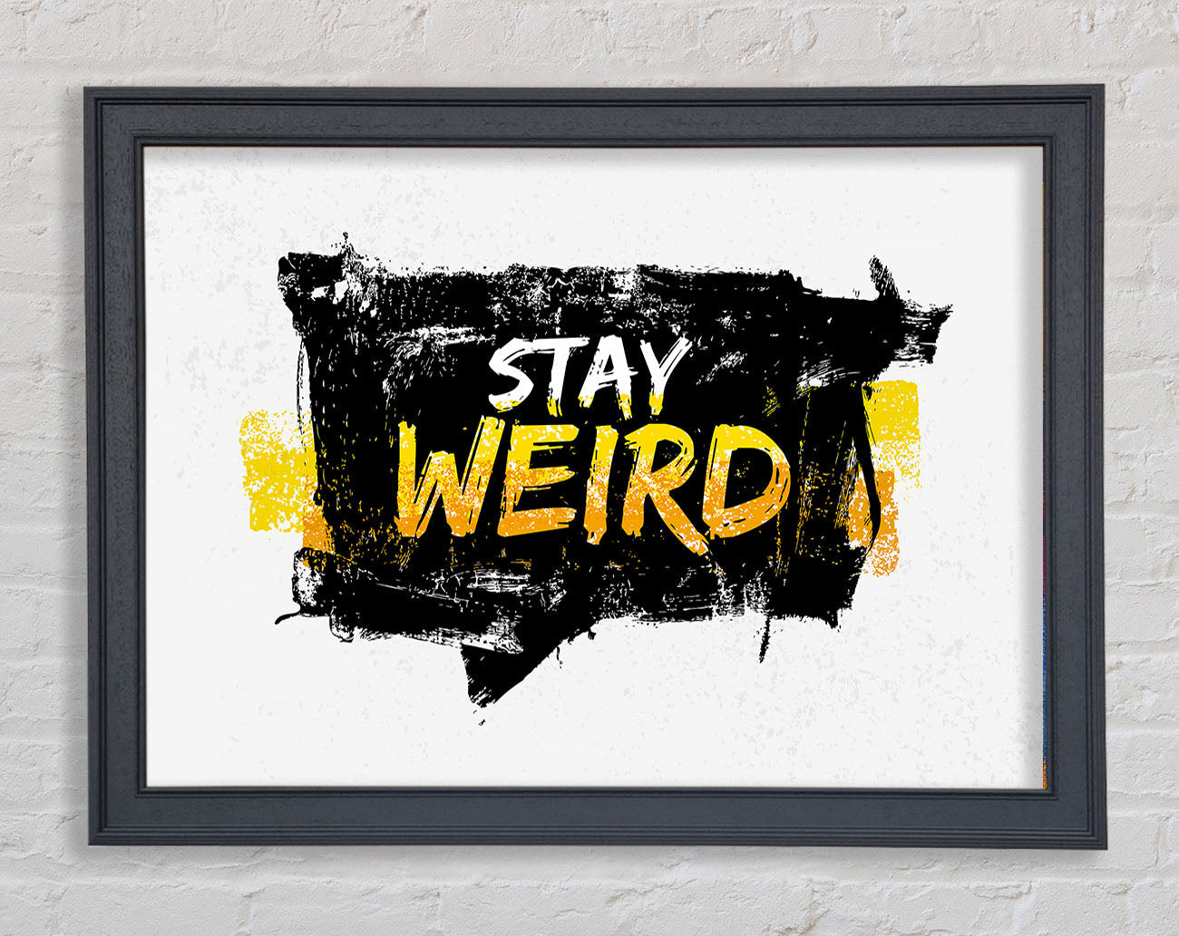 Stay Weird Framed Print