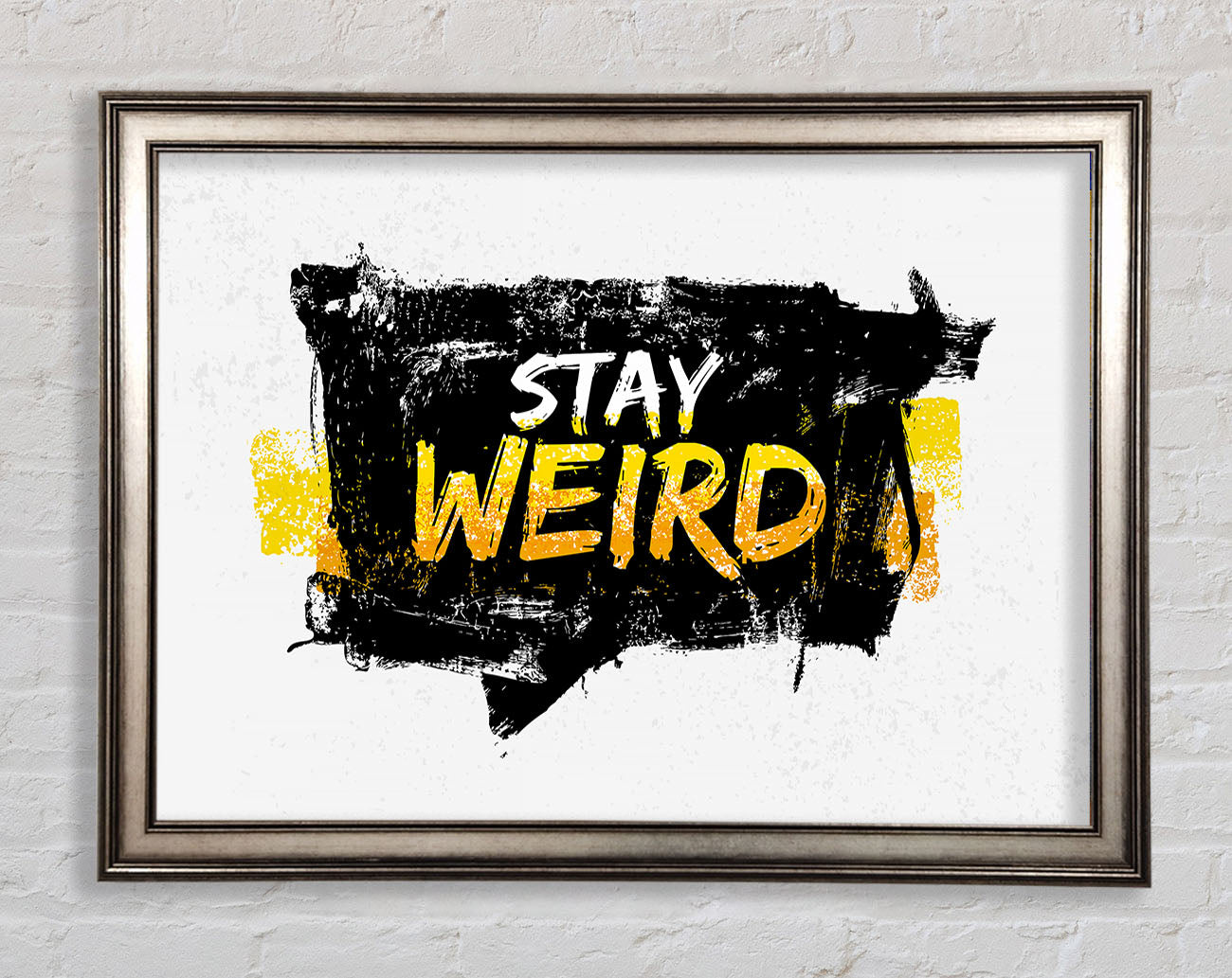 Stay Weird Framed Print