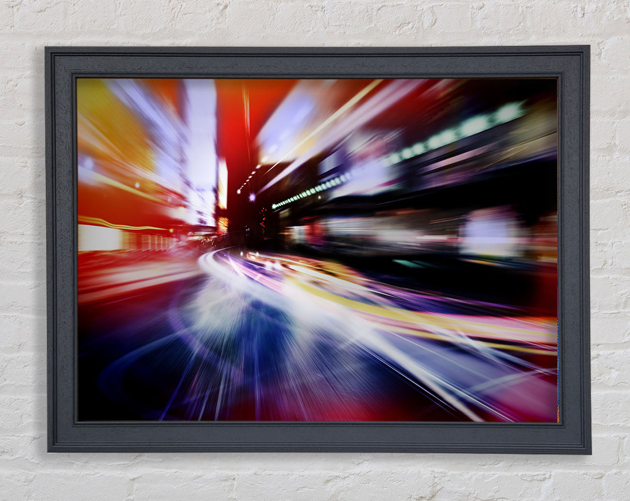 City in a blur colourful light Framed Wall Art
