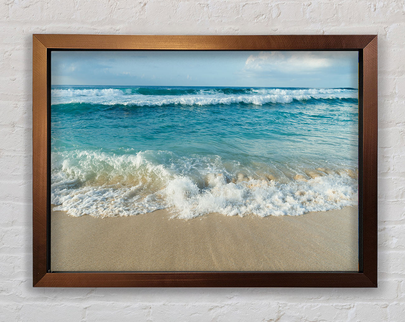 Crashing waves on the sandy beach Framed Wall Art