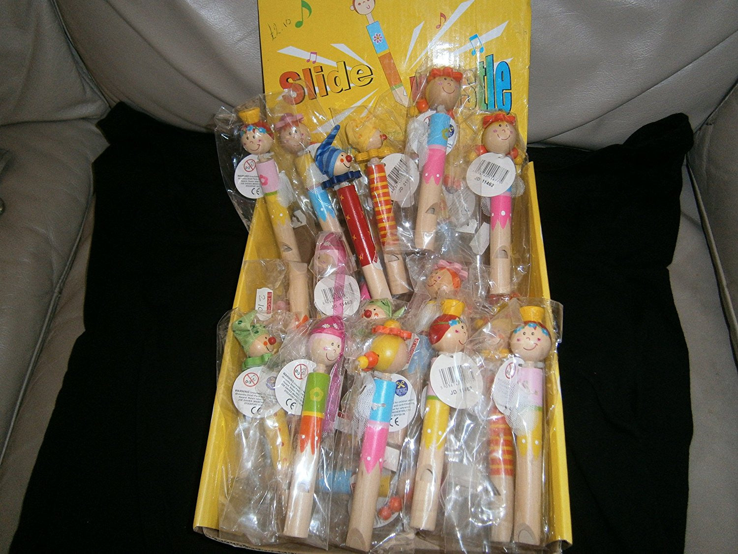 slide clown whistle various colours/faces one supplied