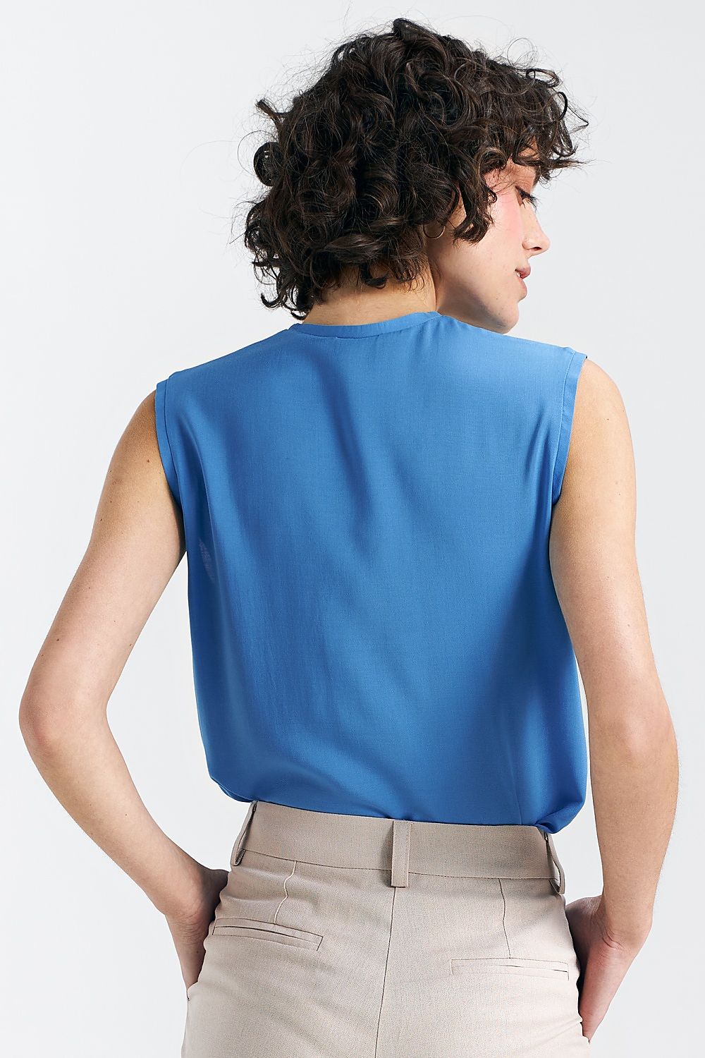 Elegant Plum Viscose Blouse With V-Neckline And Delicate Pleat Detail by Nife