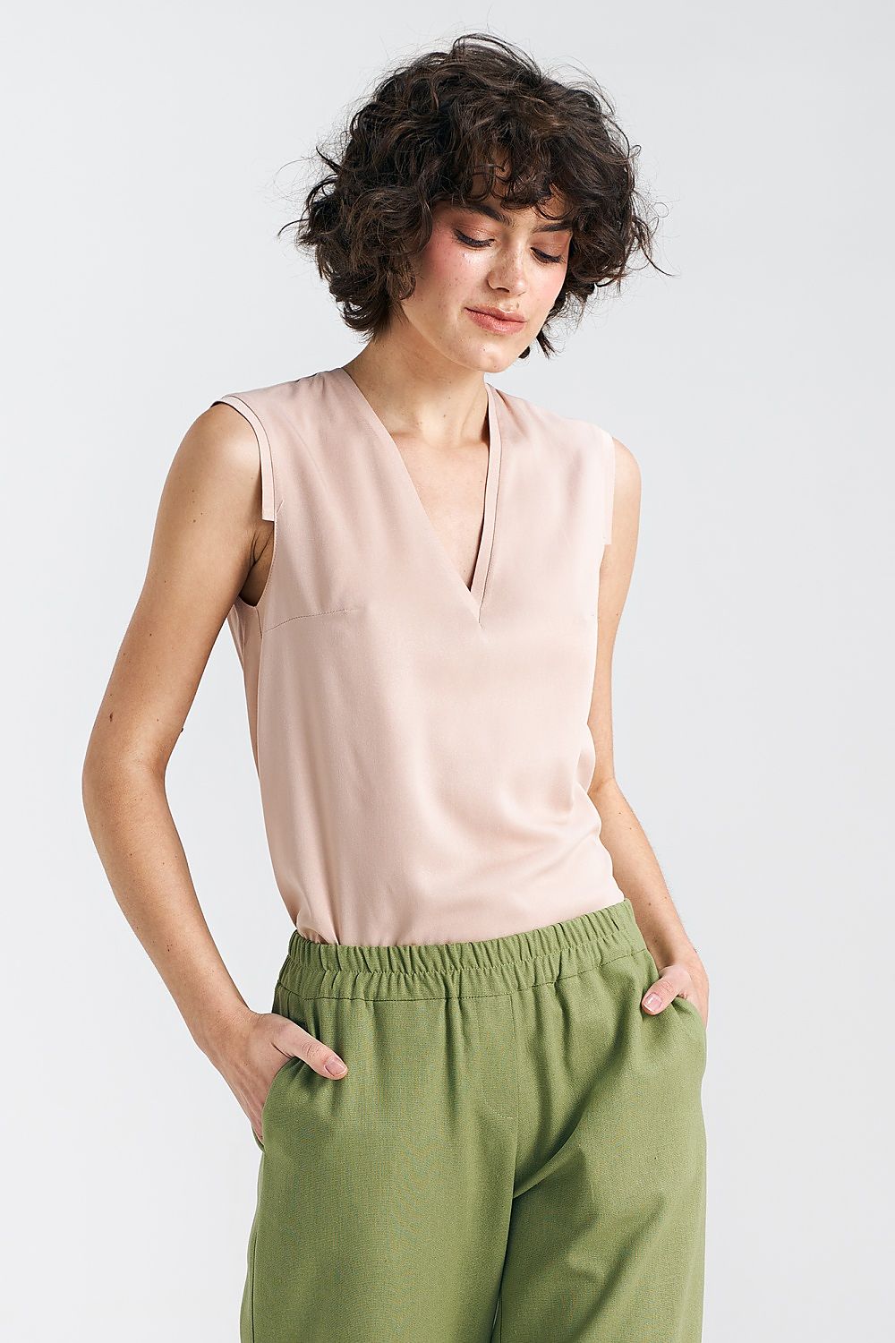 Elegant Plum Viscose Blouse With V-Neckline And Delicate Pleat Detail by Nife