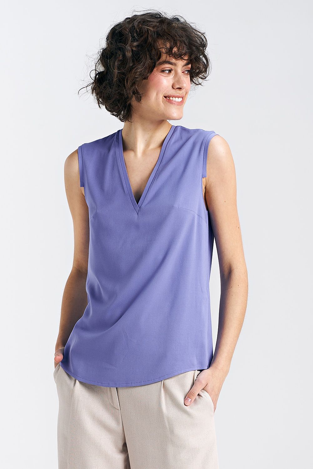 Elegant Plum Viscose Blouse With V-Neckline And Delicate Pleat Detail by Nife