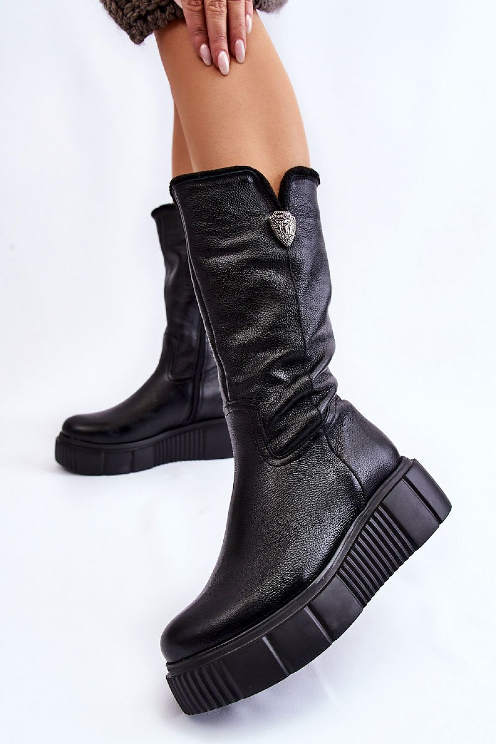 Luxury Women's Thigh-High Leather Boots with Insulated Wool Lining and Decorative Accent