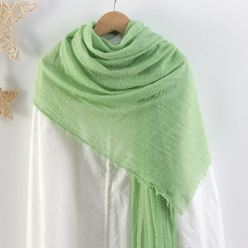 Hot selling solid color pleated cotton and linen scarf women's bag headscarf crumpled hair fringe bubble scarf women's scarf cover head