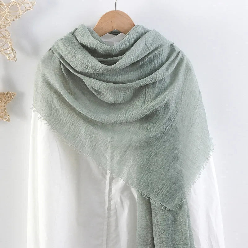 Hot selling solid color pleated cotton and linen scarf women's bag headscarf crumpled hair fringe bubble scarf women's scarf cover head