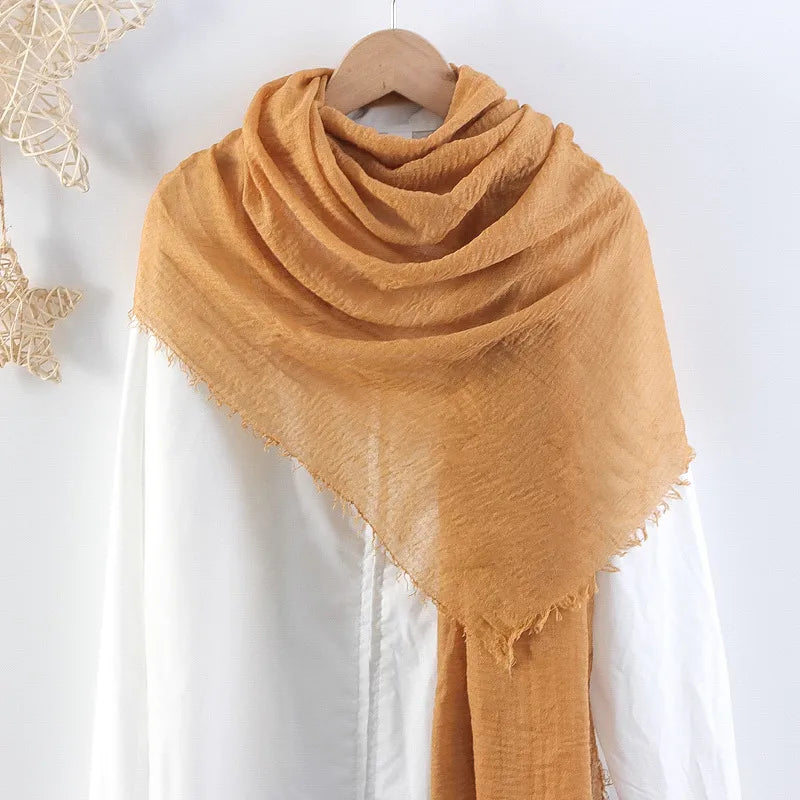 Hot selling solid color pleated cotton and linen scarf women's bag headscarf crumpled hair fringe bubble scarf women's scarf cover head
