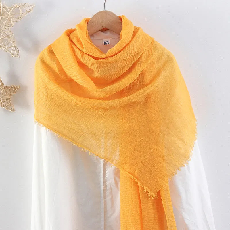 Hot selling solid color pleated cotton and linen scarf women's bag headscarf crumpled hair fringe bubble scarf women's scarf cover head
