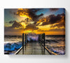 Waves Crashing On The Pier At Sunset Canvas Wall Art