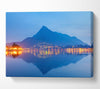 The Blue Mountain Reflects In The Tranquil Ocean Canvas Wall Art
