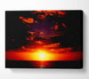 Sunset Through The Black Ocean Clouds Canvas Wall Art