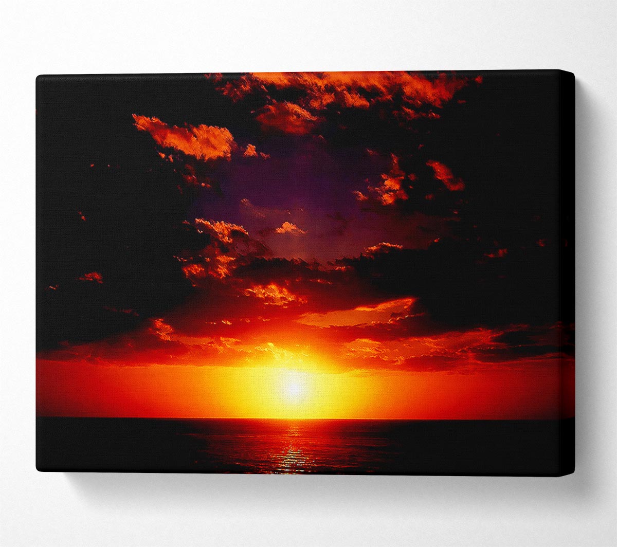 Sunset Through The Black Ocean Clouds Canvas Wall Art