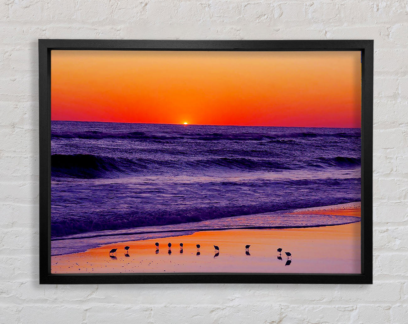 As The Sun Sets Over The Ocean Framed Wall Art
