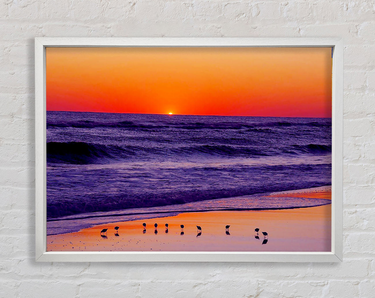 As The Sun Sets Over The Ocean Framed Wall Art