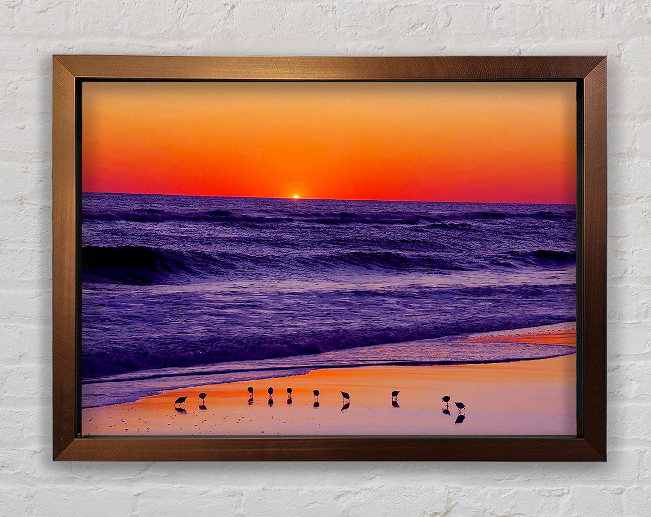 As The Sun Sets Over The Ocean Framed Wall Art