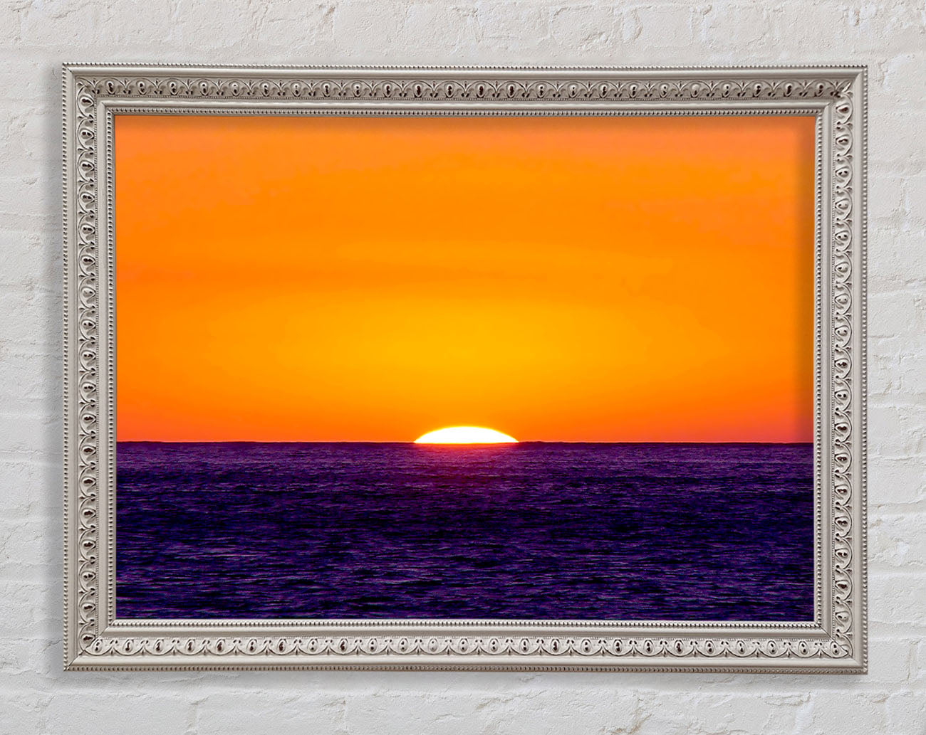 As The Sun Goes Down Over The Ocean Orange Framed Wall Art