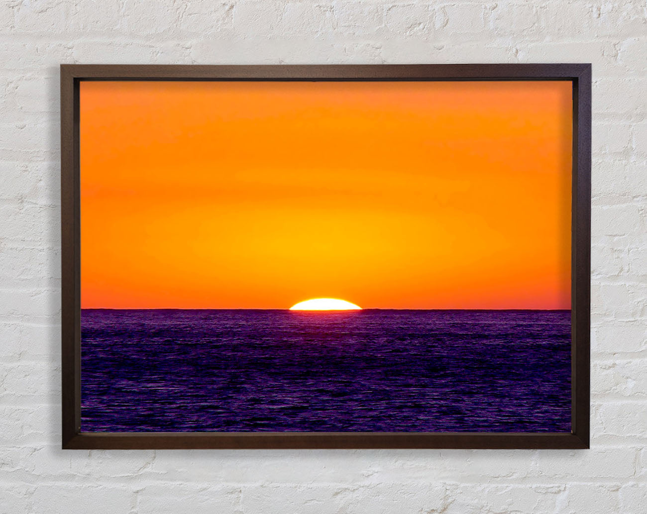 As The Sun Goes Down Over The Ocean Orange Framed Wall Art