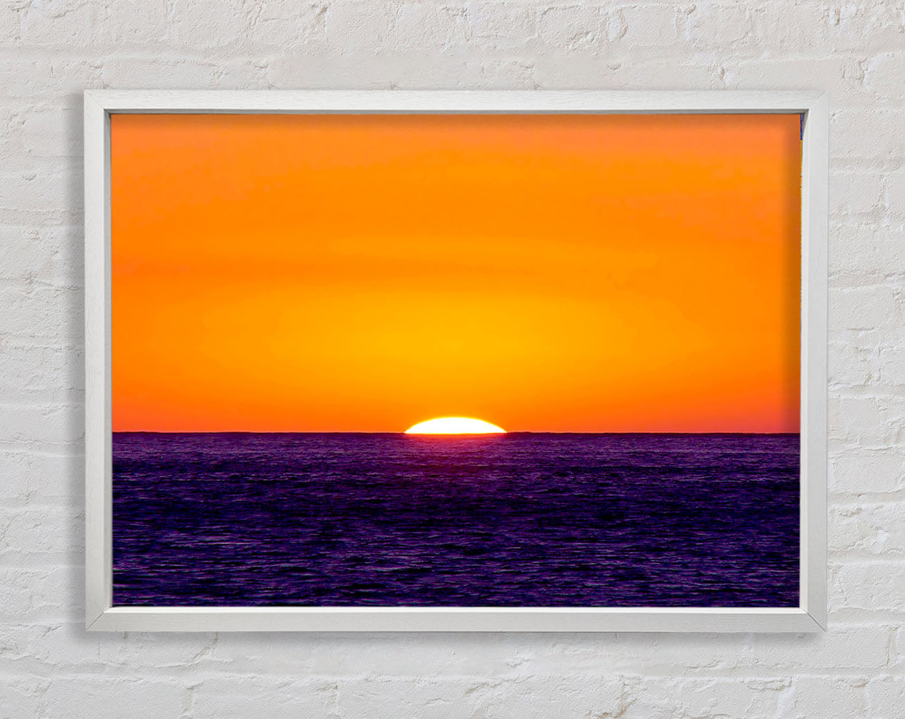 As The Sun Goes Down Over The Ocean Orange Framed Wall Art