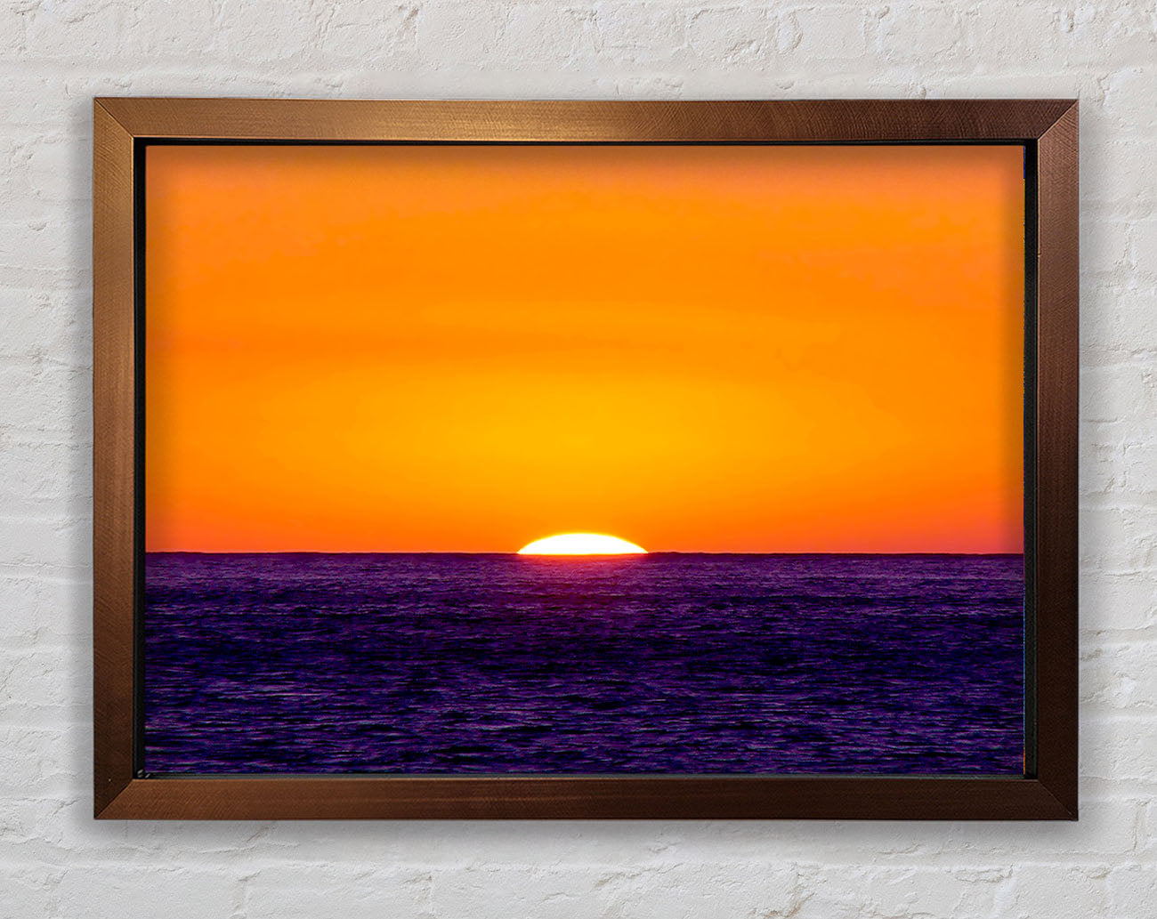 As The Sun Goes Down Over The Ocean Orange Framed Wall Art