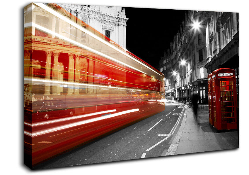 Red Bus Speeding Through The City Canvas Wall Art