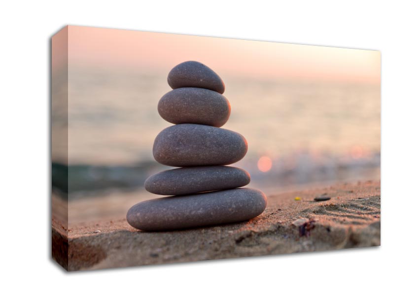 Zen stones stacked up on beach Canvas Wall Art