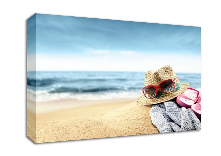 Sun hat and sunglasses on the beach Canvas Wall Art
