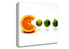 Lime Eating Orange Canvas Wall Art