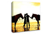 Riding Horses On The Beach Canvas Wall Art