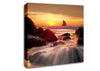 Ocean Waves Spilling On The Rocks Canvas Wall Art