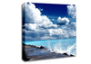 Gentle Waves Crashing In The Cloud Filled Sky Canvas Wall Art