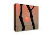 Red Sun Through The Ocean Trees Canvas Wall Art