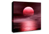 The Huge Red Sun Over The Grey Ocean Canvas Wall Art
