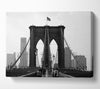 Cycling To The City Through Brooklyn Bridge Canvas Wall Art