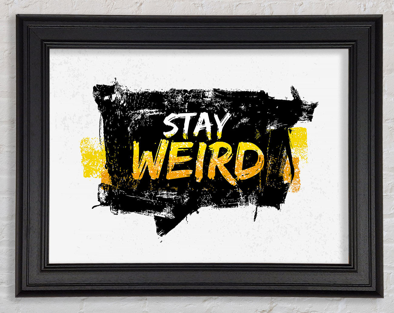 Stay Weird Framed Print
