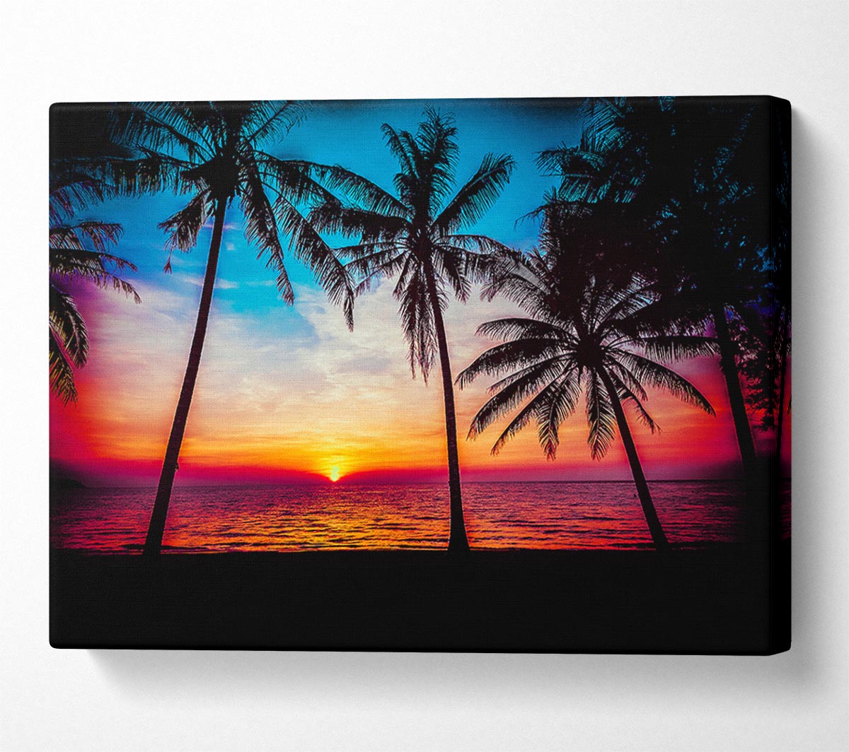 As The Sun Goes Down Between The Palm Trees Canvas Wall Art