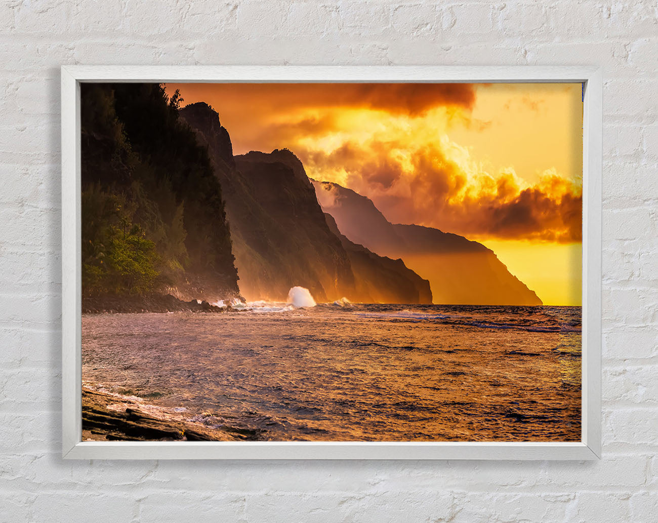 Cliff sunset crashing ocean Framed Wall Art