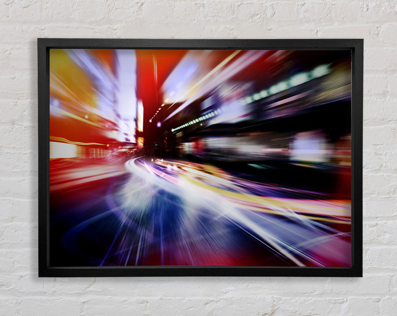 City in a blur colourful light Framed Wall Art