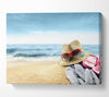 Sun hat and sunglasses on the beach Canvas Wall Art