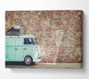 The Camper In Front Of Bricks Canvas Wall Art