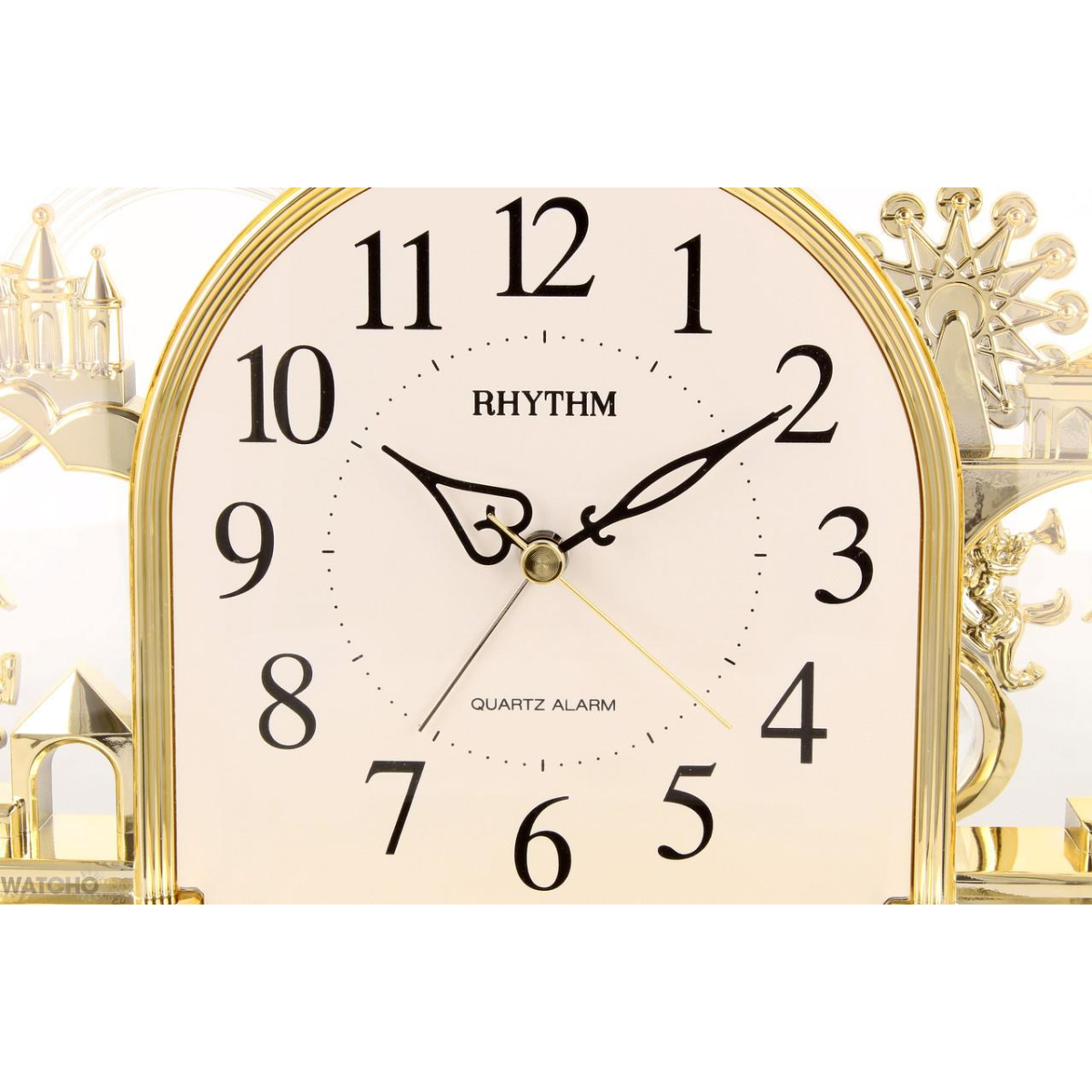 Rhythm Alarm Mantel Clock with Rotating Swarovski Crystal Pendulum Gilt