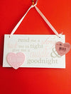 Pink Read me a story tuck me in tight give me a cuddle and kiss me goodnight wooden hanging plaque