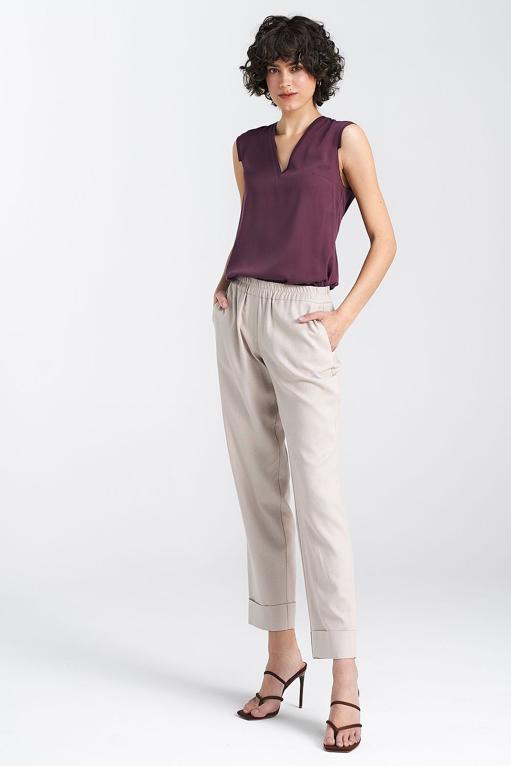 Elegant Plum Viscose Blouse With V-Neckline And Delicate Pleat Detail by Nife