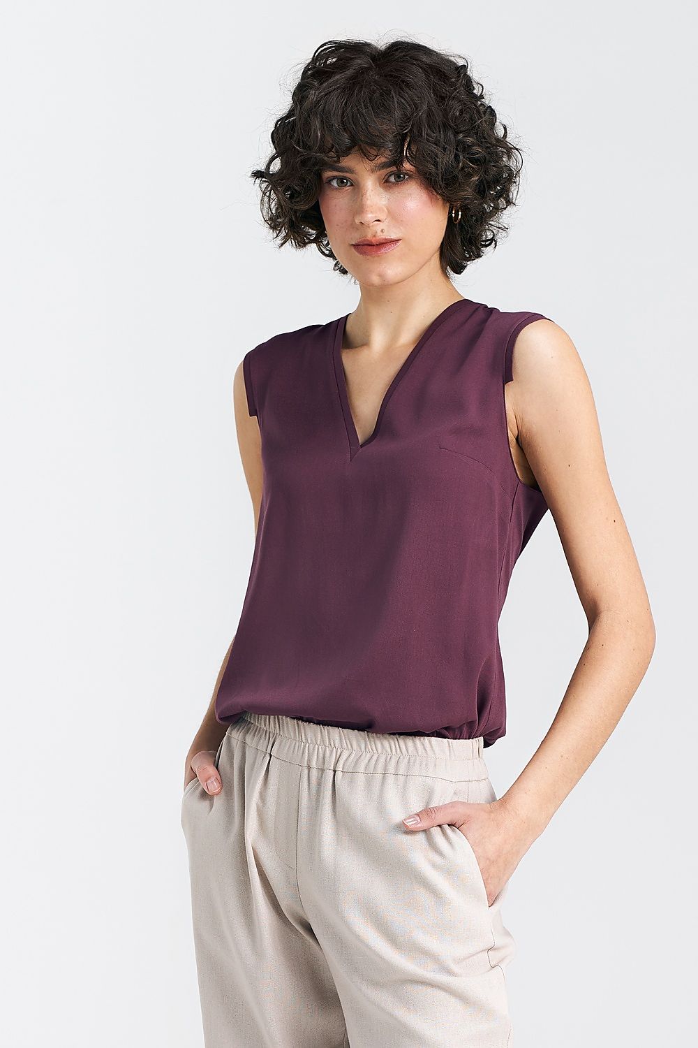 Elegant Plum Viscose Blouse With V-Neckline And Delicate Pleat Detail by Nife